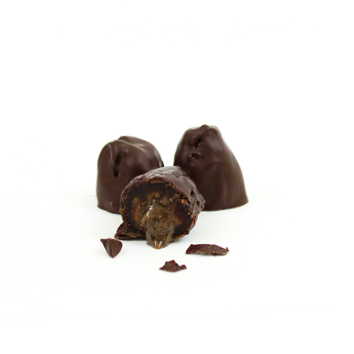 Chocolate Covered California Medjool Date: filled with sunflower butter + Organic espresso